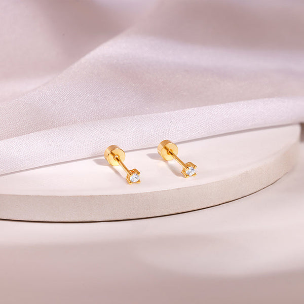 Golden Lian Ear Piercings