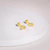 Golden Eyeconic Ear Piercings